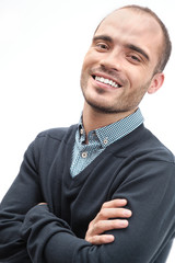 Portrait of a handsome young business man looking at camera smil