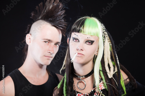 Couple Of Cyber Punk Girl And Punk Rock Man With Mohawk