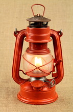 Red Oil Lamp On Burlap