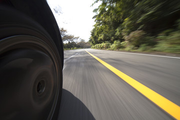 Driving at mountain road .