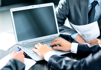 Group of happy business people in a meeting at office