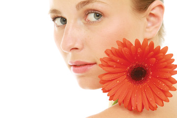 Young lady with red gerbera isolated on white background