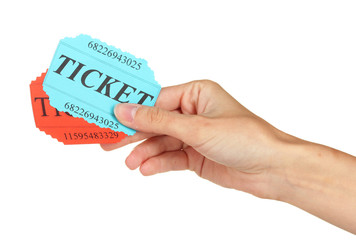 Woman's hand holding a colorful tickets