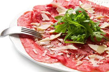 Wall Mural - carpaccio di carne con gran e rucola