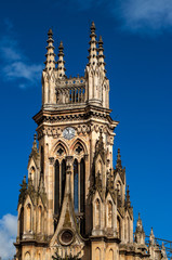 Wall Mural - Tower of Loudes church with blue sky in Bogota, Colombia