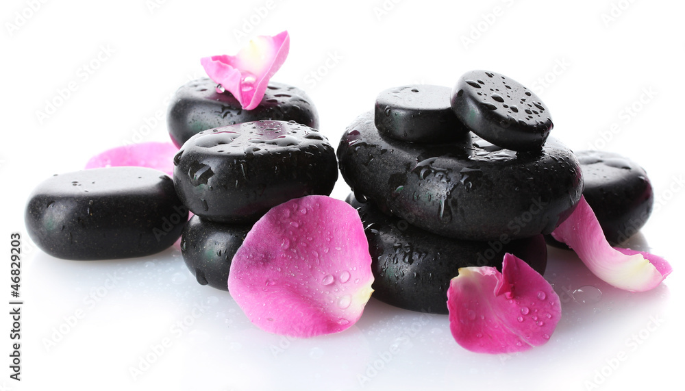 Spa stones with drops and rose petals isolated on white