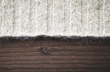 Wall Mural - wool sweater on wood