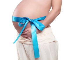 Pregnant Belly With Blue Ribbon - Isolated Over A White Backgrou