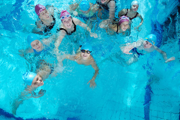 Wall Mural - happy childrens at swimming pool