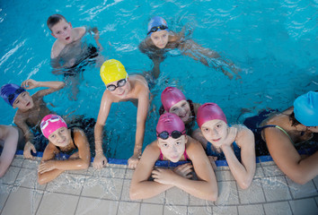 Canvas Print - happy children group  at swimming pool