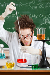 Wall Mural - Mad professor holds some experiments in his laboratory