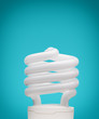 energy saving light bulb on blue background