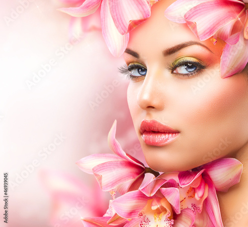 Naklejka na drzwi Beautiful Girl With Orchid Flowers. Beauty Woman Face