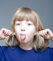 Wall Mural - boy sticking out tongue