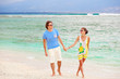 © el.rudakova - young happy couple having fun on tropical beach. honeymoon
