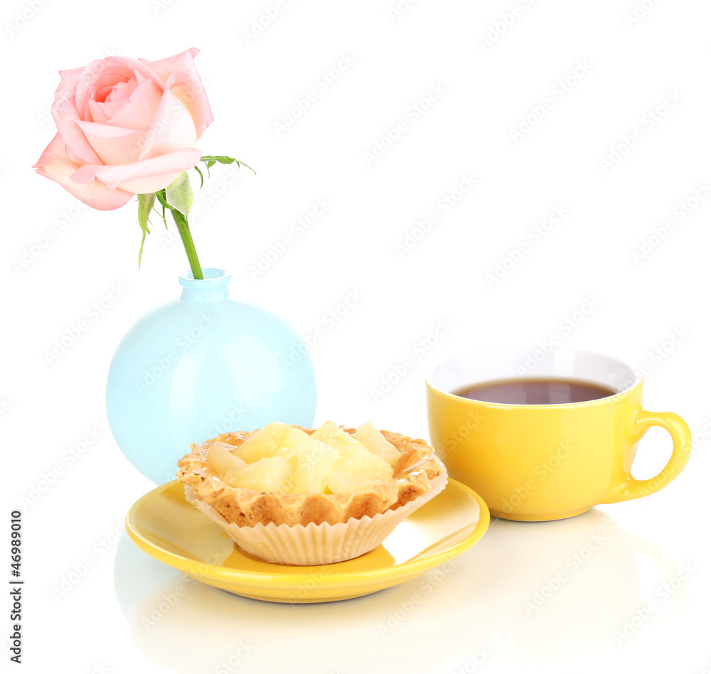 sweet cake with cup of tea isolated on white