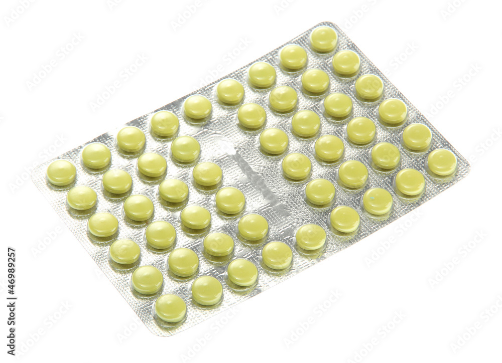 pills packed in blisters, isolated on white