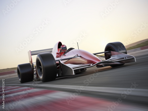 Naklejka na meble Indy car racer with blurred background