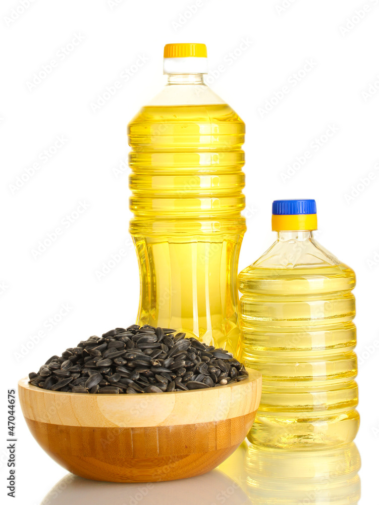 sunflower oil with sunflower seeds isolated on white background
