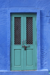 Painted wooden door in the blue city of Jodhpur