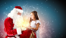 Portrait Of Santa Claus With A Girl