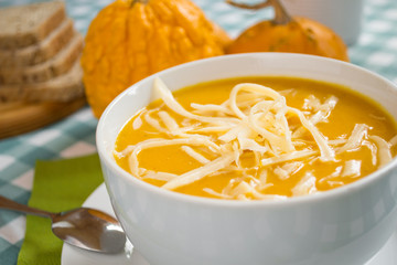 Pumpkin soup in a white plate