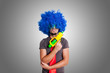 © Eugenio Marongiu - Funny guy with blue wig and water gun