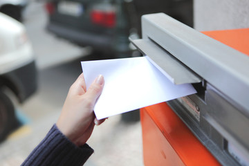 girl posting a letter