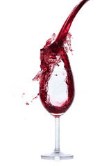 Wall Mural - red wine pouring splash, isolated