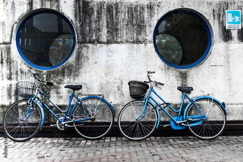 Fototapeta na wymiar two blue bikes