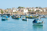 Fototapeta  - Colorful traditional fishing boats in the island of Malta