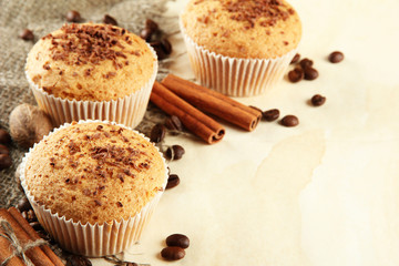 Wall Mural - tasty muffin cakes with chocolate, spices and coffee seeds,