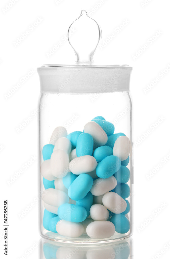 Transparent bottle with pills isolated on white