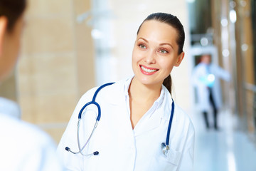 Portrait of two friendly female doctors