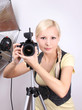 © Guzel Studio - young beautiful photographer with the professional camera
