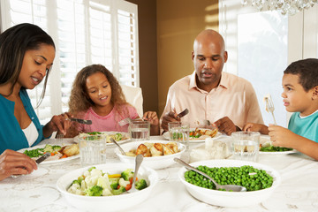 Wall Mural - Family Enjoying Meal At Home