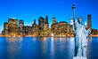 Manhattan Skyline and The Statue of Liberty at Night, New York C