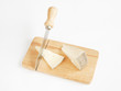 © roberaten - sheep cheese with knife on wood