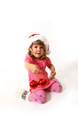 New Year or Christmas sweet baby in a pink dress isolated on whi