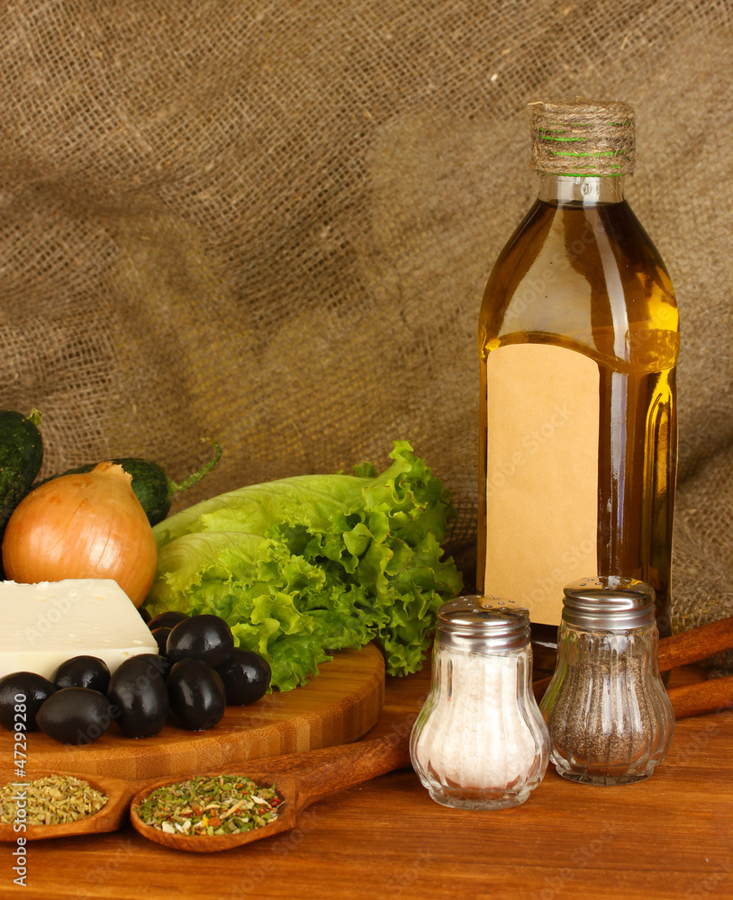 Ingredients for a Greek salad on canvas background close-up