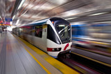 Fototapeta  - Fast LRT train in motion, Kuala Lumpur