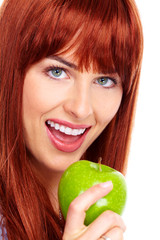 Wall Mural - Young beautiful woman with apple.