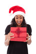 © Samuel B. - Young African American woman opening a gift box