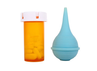 Wall Mural - blue medical enema and pill bottle isolated on white