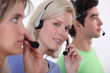 © auremar - Three call-center workers