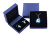 blue stone pendant and earring in blue present box isolated