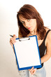 © kolotype - Attractive teenage woman with a blank clipboard