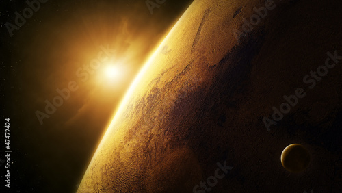 Fototapeta na wymiar Planet Mars close-up with sunrise in space