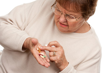 Wall Mural - Attractive Senior Woman and Medication Pills.