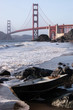 Golden Gate Bridge and a boat at beach - San Francisco